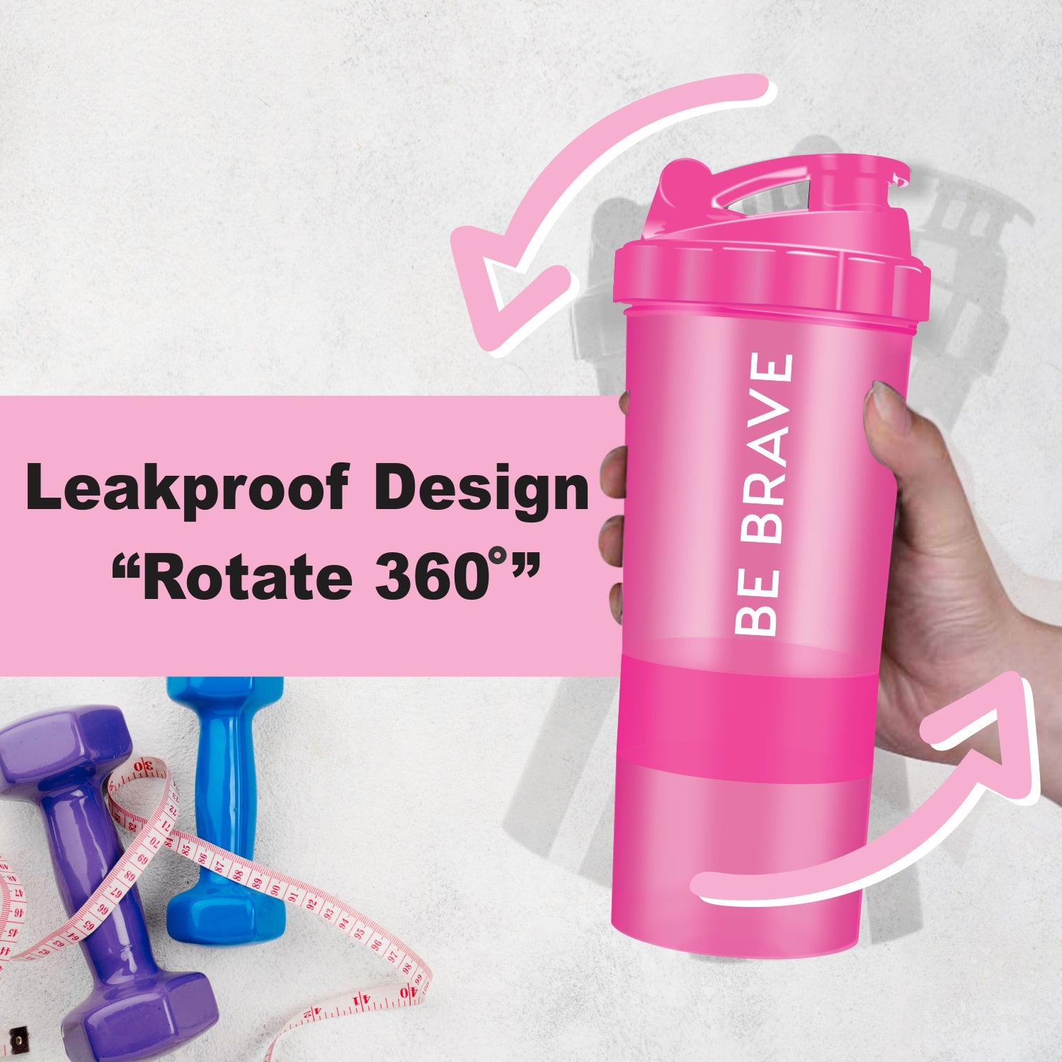 Pink protein shaker bottle with 360° leakproof design, held in hand, ideal for gym and fitness enthusiasts.